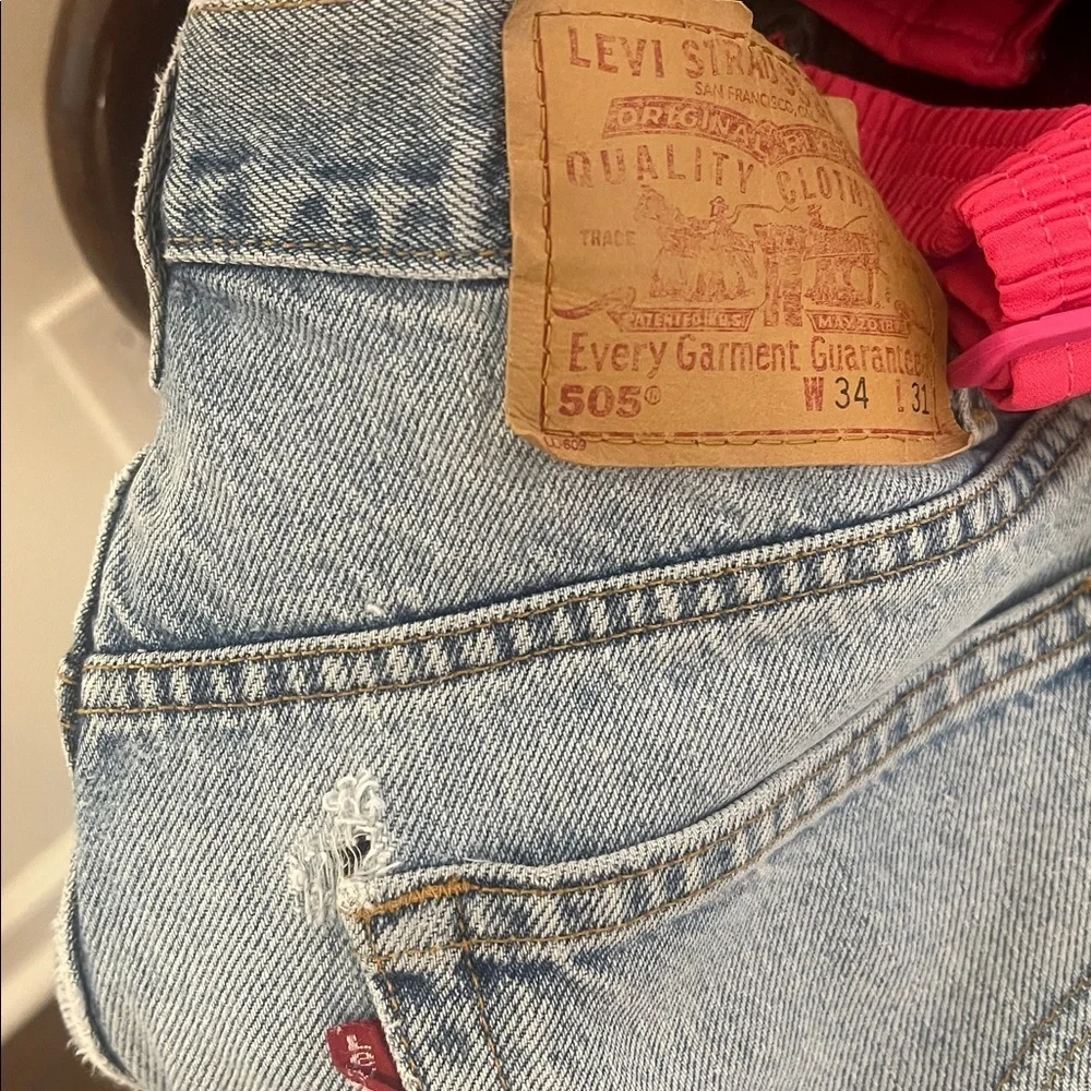 Vintage Men's distressed Blue Jeans 34x31